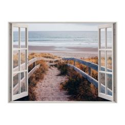 Fen&ecirc;tre avec vue sur une dune et la mer