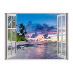 Fen&ecirc;tre avec vue sur une plage au coucher de soleil
