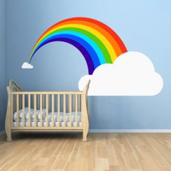 Arc-en-ciel entre deux nuages