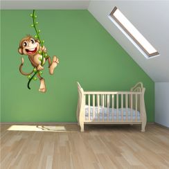 Singe qui se balance sur sa liane